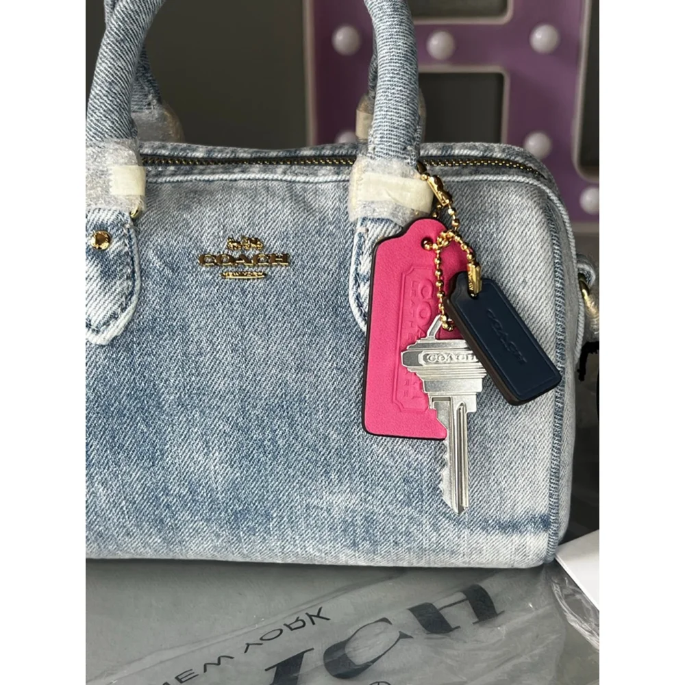 Coach Mini Rowan Crossbody Bag In Loved Denim With Charms